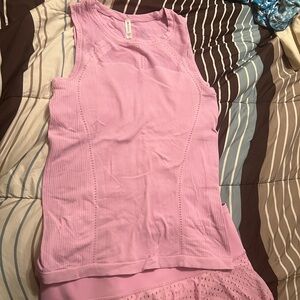Athleta Pink Pickle Ball skirt and top sz L
Oxygen tank and A game skort